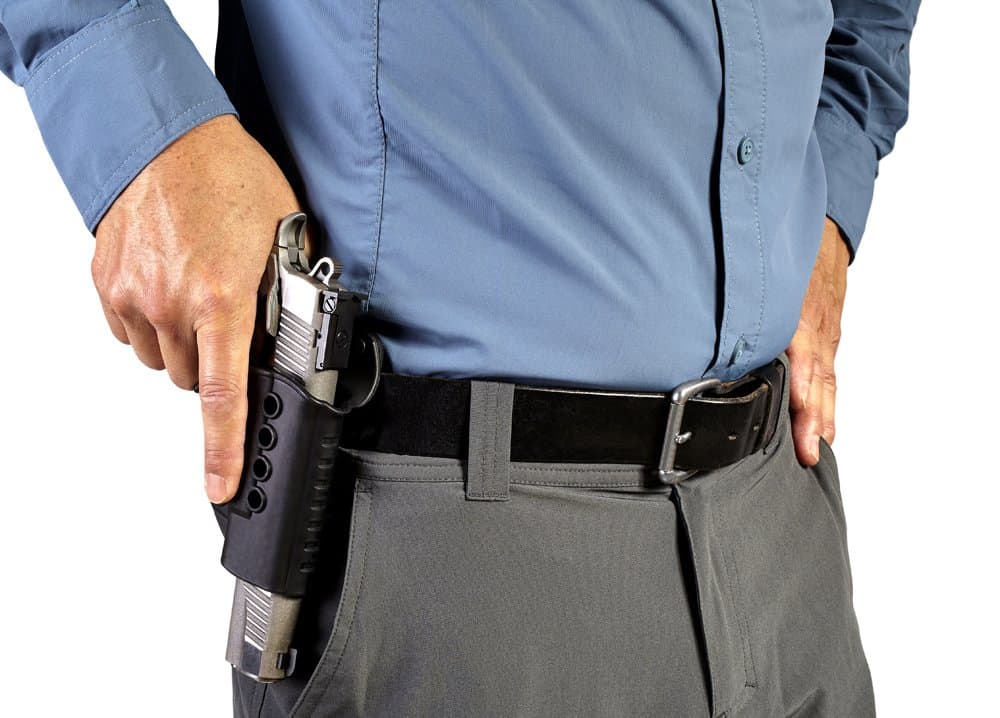 man with gun in holster
