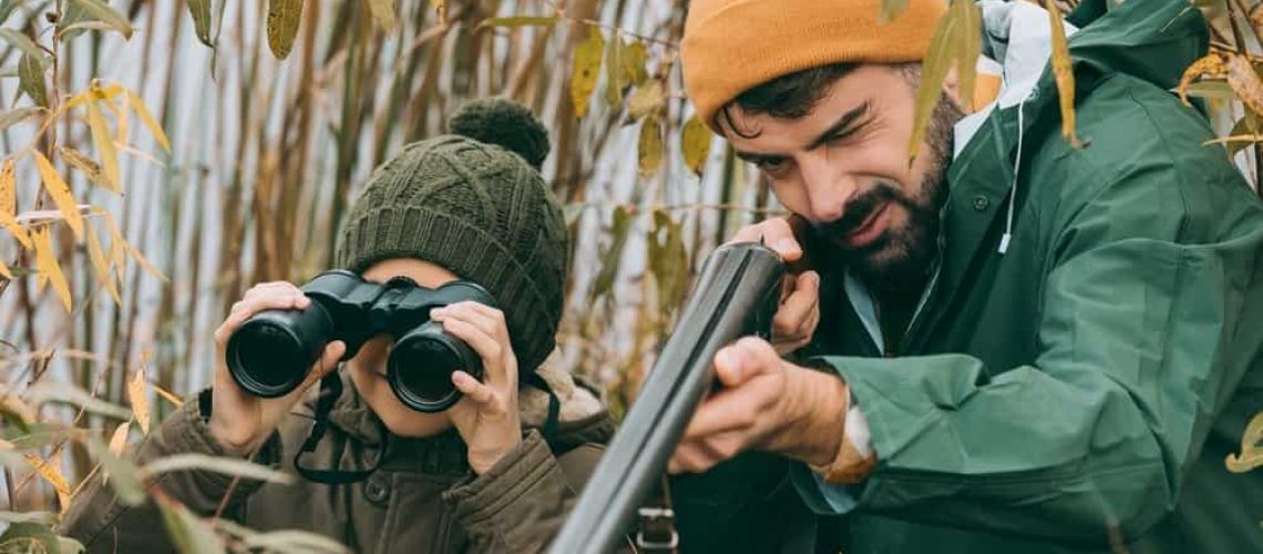 Father-And-Son-Hunting-With-Binoculars