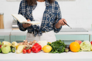 Woman Listing Her Own Meal Preparation