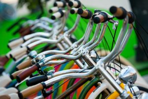 row of bicycles handlebars